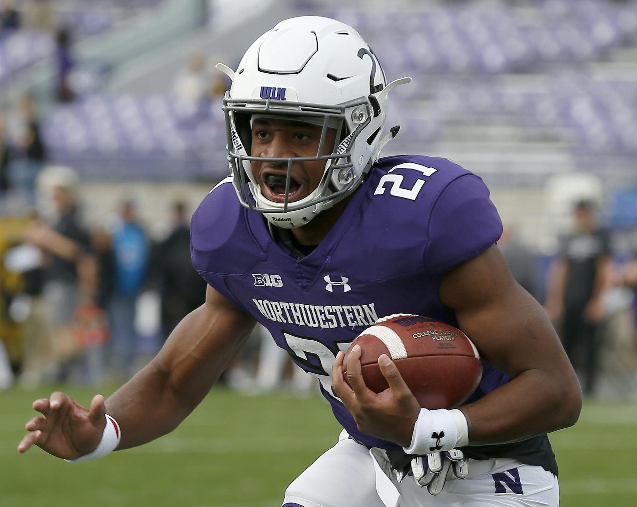 Northwestern's Justin Jackson warms up before an NCAA college football game against Iowa Saturday, Oct. 21, 2017, in Evanston, Ill. (AP Photo/Jim Young)