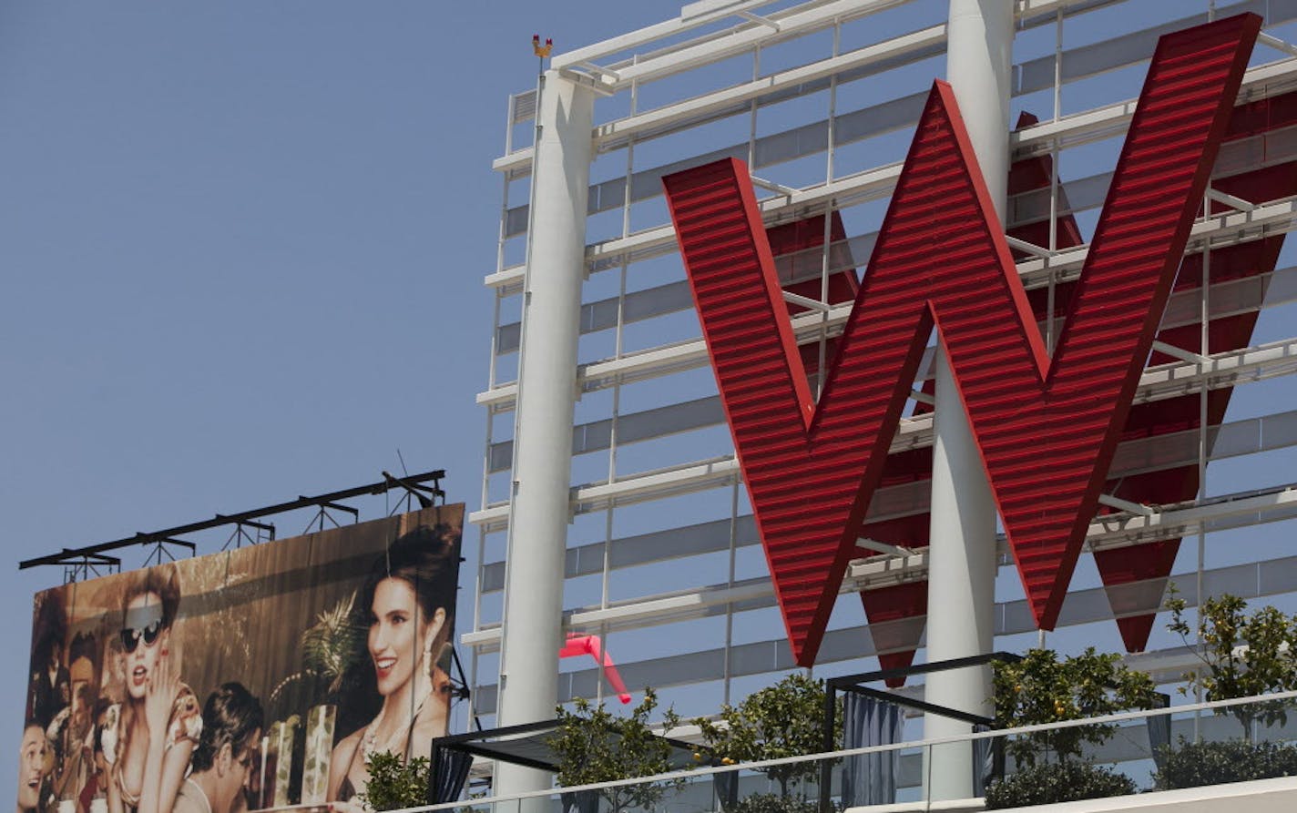 FILE - A Tuesday, July 17, 2012 file photo, shows Starwood Hotels W Hollywood hotel logo in Los Angeles. Starwood is calling off a $12.2 billion buyout agreement with Marriott in favor of an offer from a group of investors led by the Chinese insurance company Anbang. The decision came after Anbang upped its offer for Starwood by nearly $370 million Friday, March 18, 2016 bringing the total deal to more than $14 billion. (AP Photo/Damian Dovarganes, File)