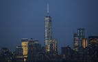 One World Trade Center dominates the New York city skyline as seen from New York harbor, Tuesday, July 7, 2015, in New York. (AP Photo/Kathy Willens)