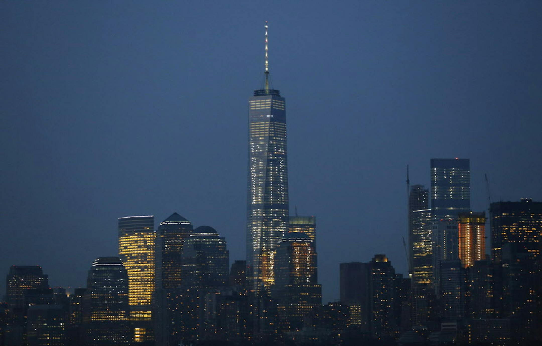 One World Trade Center dominates the New York city skyline as seen from New York harbor, Tuesday, July 7, 2015, in New York. (AP Photo/Kathy Willens)