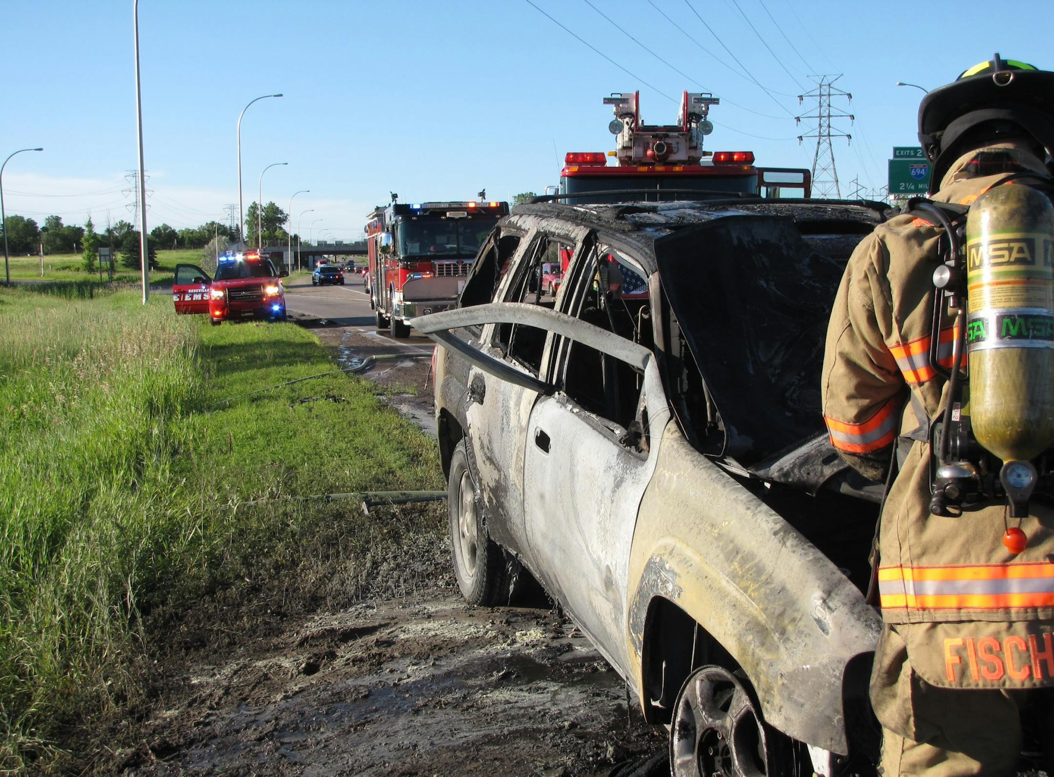 Robert Renning, of Woodbury, rescued a man from a burning vehicle after the carís doors and power windows failed, Sunday, June 29, 2014. Photo courtesy Minnesota State Patrol.