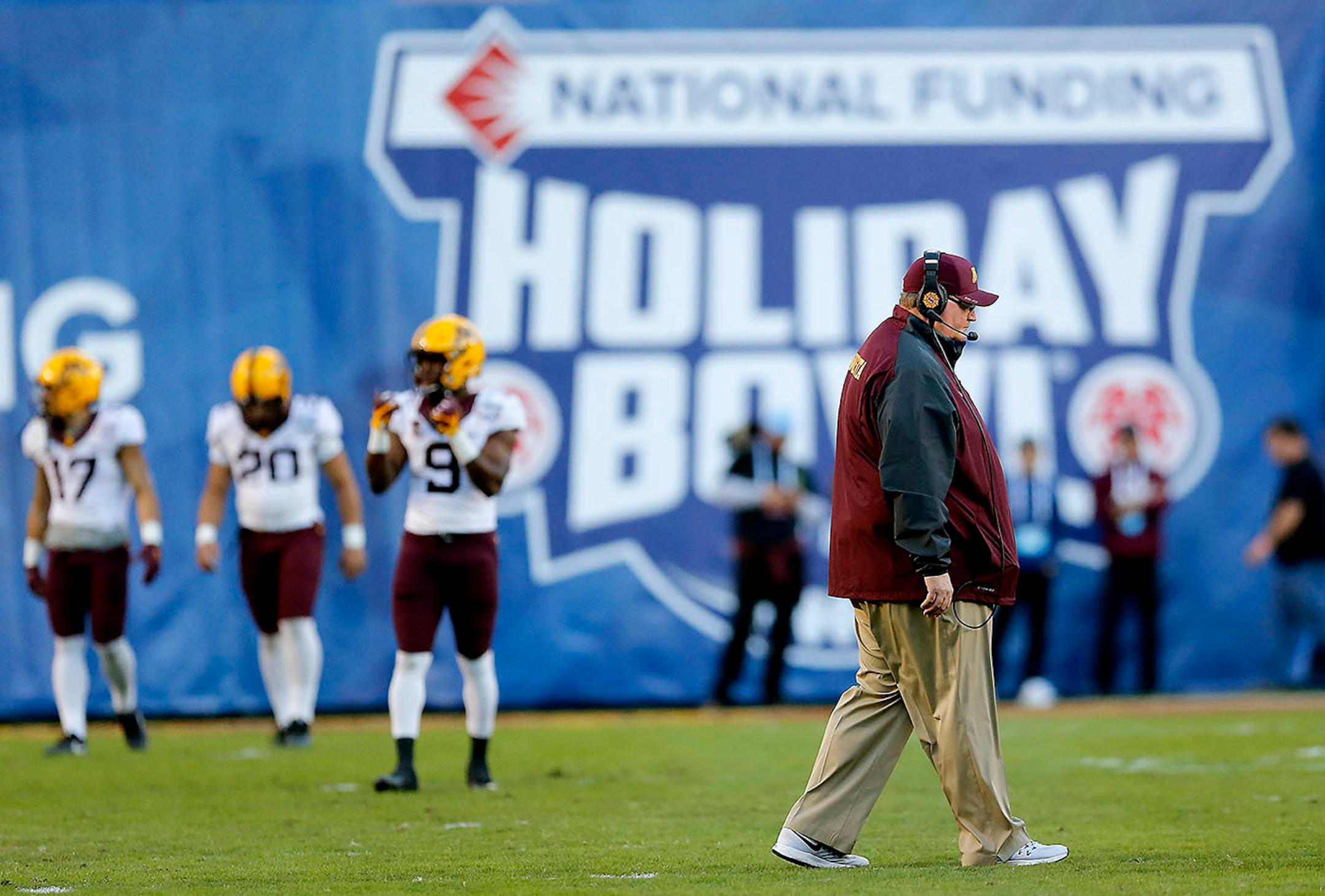 Minnesota's head coach Tracy Claeys made his way onto the field before they took on Washington State at Qualcomm Stadium for the San Diego Holiday Bowl, Tuesday, December 27, 2016 in San Diego, CA.