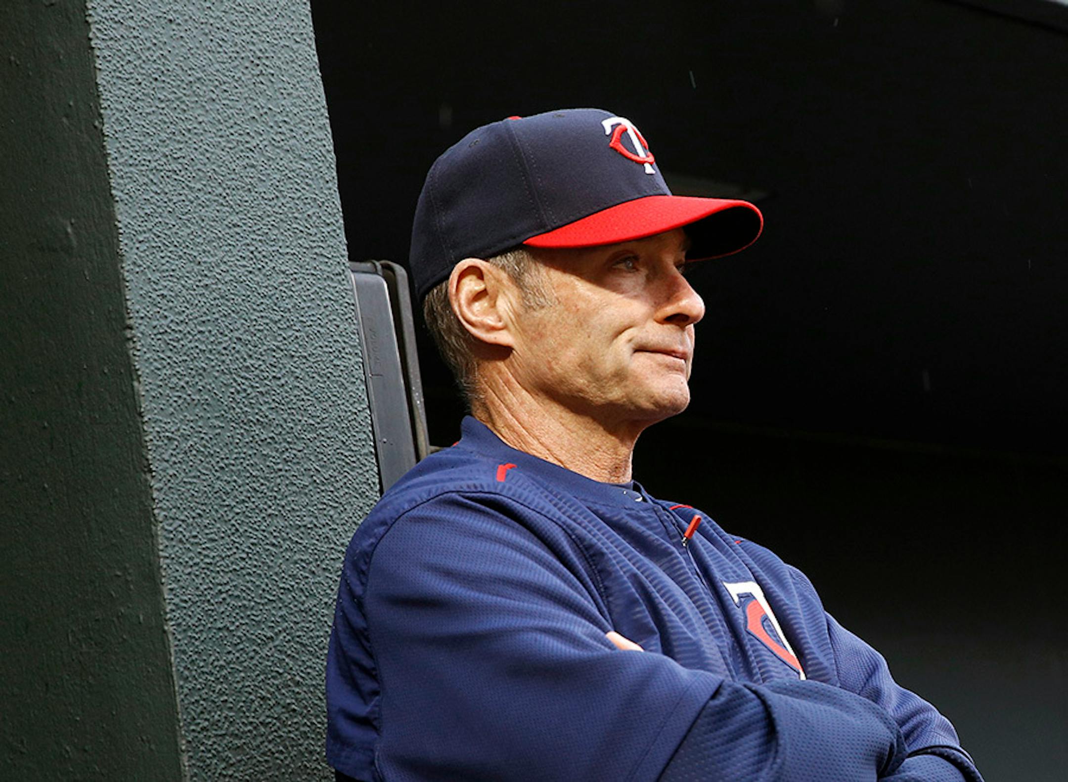 Minnesota Twins manager Paul Molitor watches from the dugout during an opening day baseball game against the Baltimore Orioles in Baltimore, Monday, April 4, 2016.