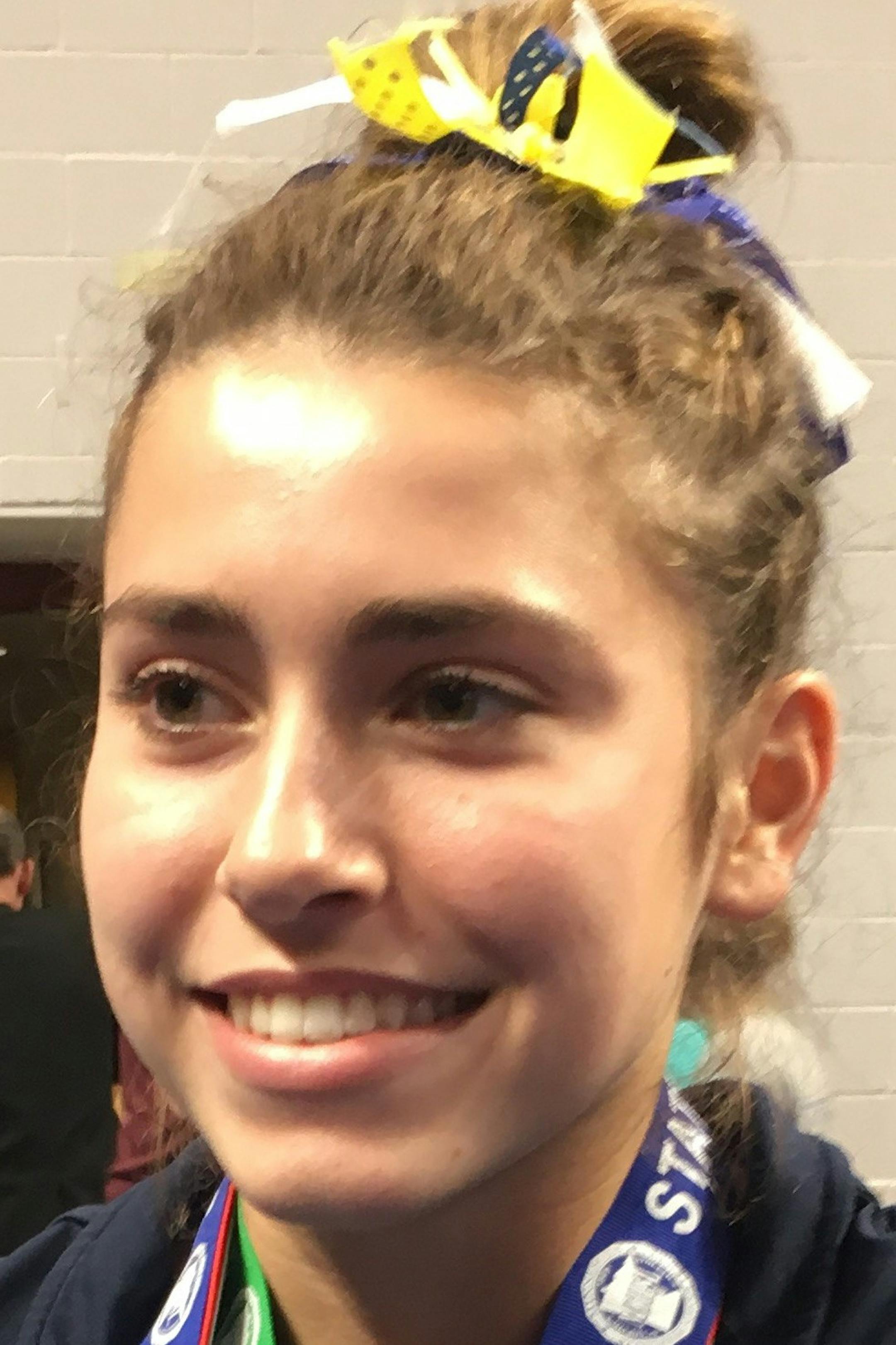 Bella Frattalone of Mahtomedi after winning the Class 1A all-around championship Saturday at the gymnastics state meet at Maturi Pavilion at the University of Minnesota. Photo: Jim Paulsen, Star Tribune