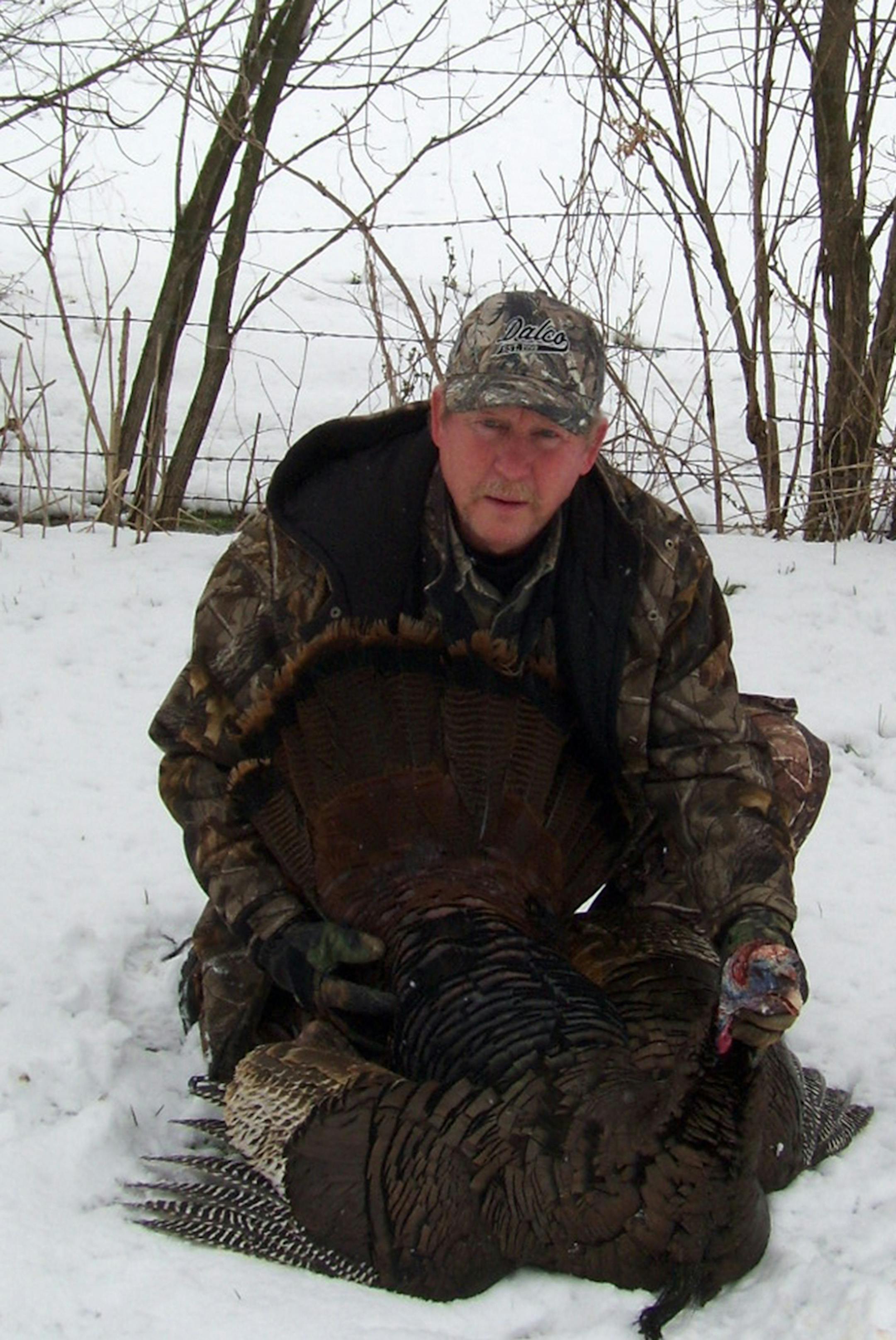 Lance Ness, longtime Minnesota conservation activist, with a gobbler he bagged in the snow in 2011. Ness has been hunting Minnesota turkeys since 1981, three years after modern hunting began following reintroduction of turkeys to the state. Photo courtsey Lance Ness