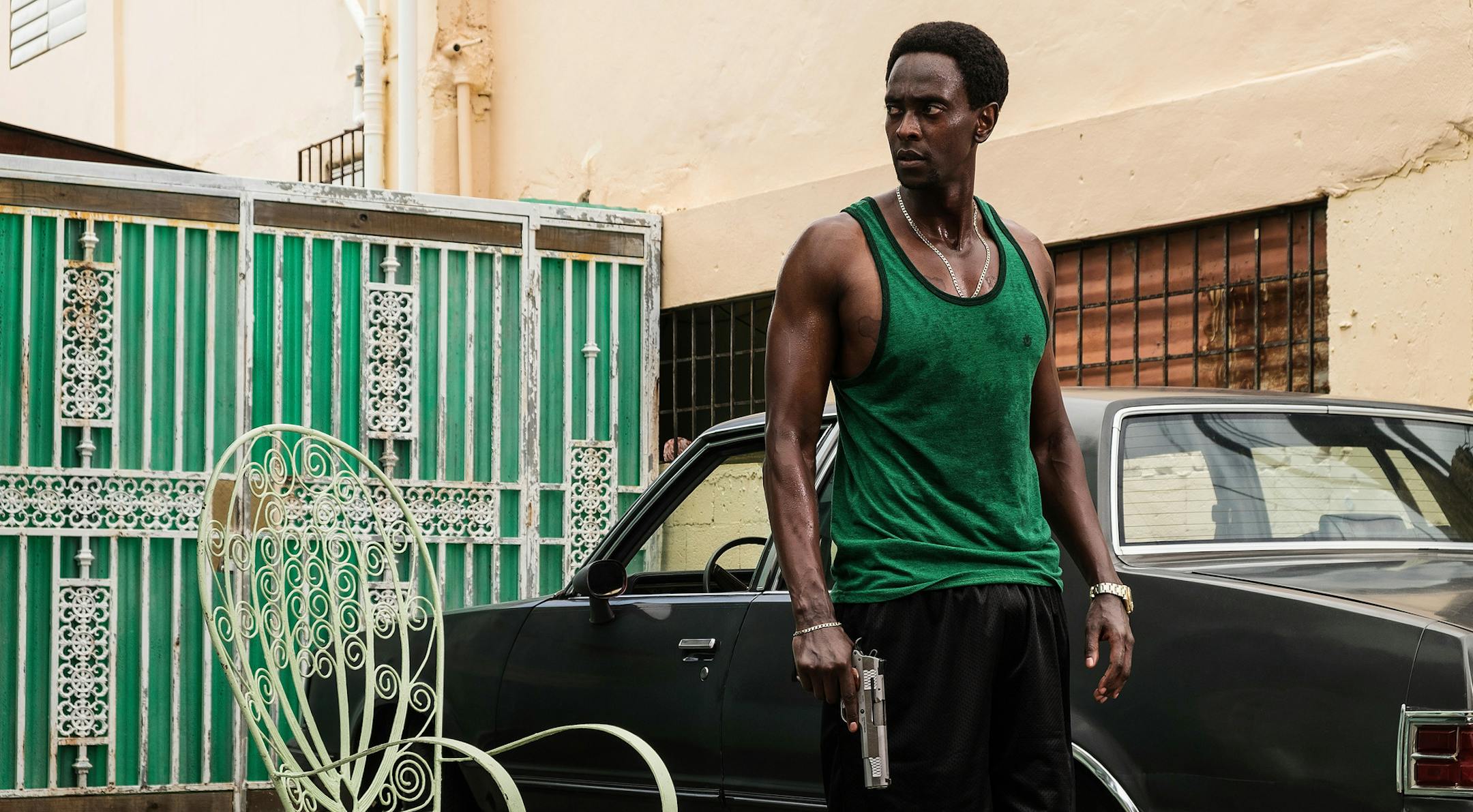 In this image provided by Crackle, Edi Gathegi plays Haitian-American gangster Ronald Dacey in the new Crackle techno-thriller ìStartUp.î It premieres Tuesday, Sept. 6, 2016, on the streaming service. (Francisco Roman/Crackle via AP)