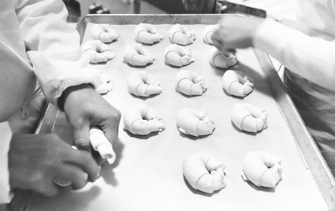 Croissants are rolled by a machine, but curved by hand.