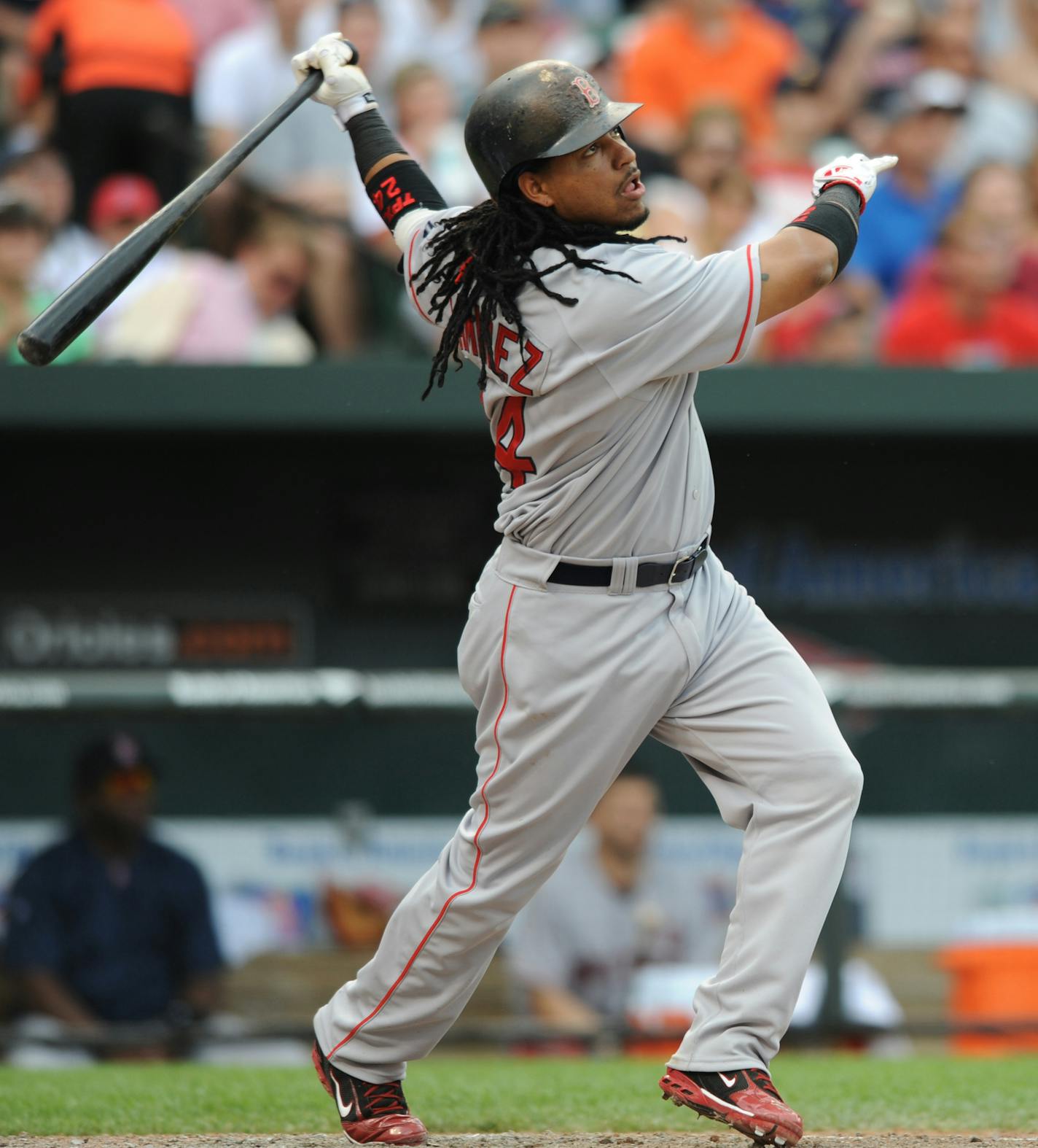 Boston Red Sox's Manny Ramirez follows through on a two-run home run against the Baltimore Orioles during the fourth inning of a baseball game Sunday, June 1, 2008, in Baltimore. (AP Photo/Gail Burton) ORG XMIT: BAB102