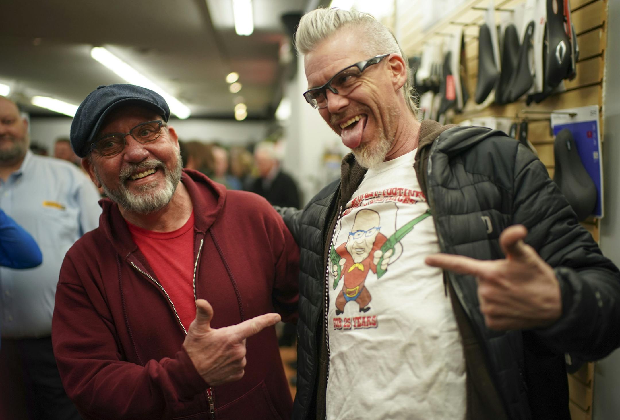 Jay "Hollywood" Henderson wore a shirt with an image of Pat Sorensen, left, on it to congratulate him on his career in the business. Henderson also owned a bike shop that has closed. The shirt commemorates Sorensen's 25 years of involvement with biking at the Buck Hill ski area.