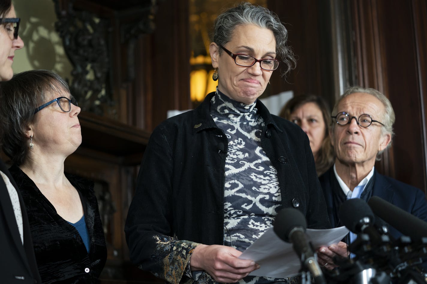 Laura Stearns read a statement at a press conference at attorney Jeff Anderson's office after a Minneapolis jury found the Children's Theatre negligent in the sexual abuse of Stearns in the 1980s.