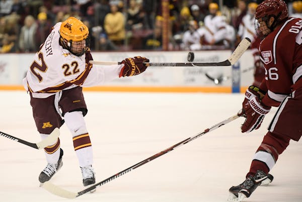 Minnesota Golden Gophers forward Tyler Sheehy (22) attempted a shot on Harvard's goal in the first period Friday. ] AARON LAVINSKY &#x2022; aaron.lavi