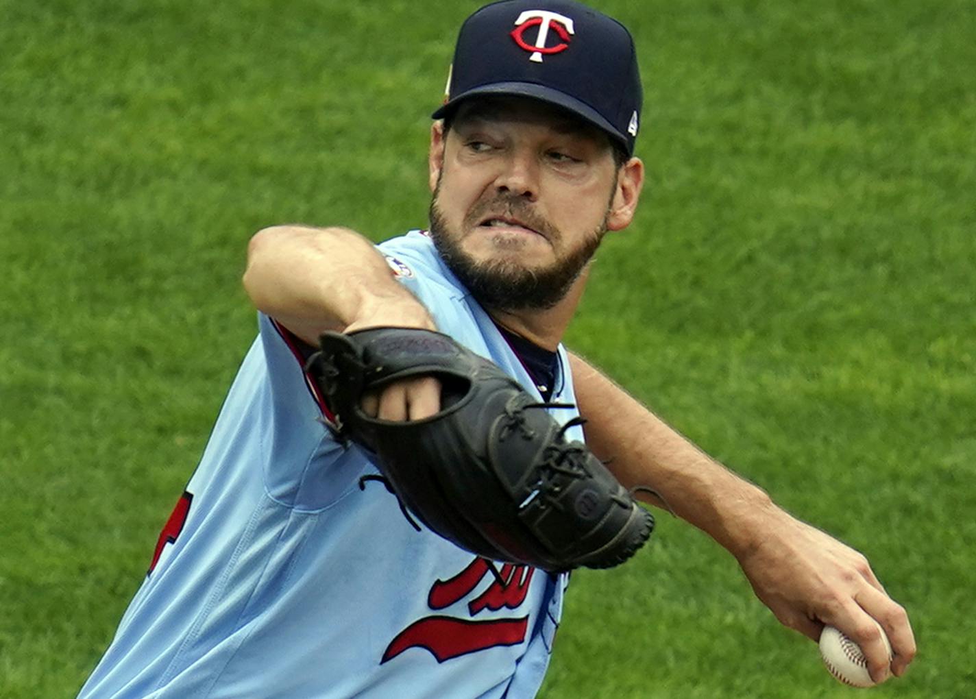 Minnesota Twins pitcher Rich Hill throws against the Detroit Tigers in the first inning of a baseball game Sunday, Sept. 6, 2020, in Minneapolis. (AP Photo/Jim Mone)