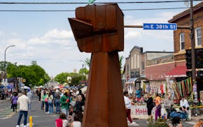 Hundreds of people visit George Floyd Square in Minneapolis on May 25, the five-year anniversary of his murder.