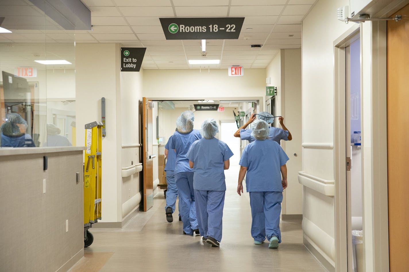 A group of healthcare workers walked through one of the hallways of St. Luke's Emergency Department as staff began to get acclimated with the new space on Monday. ] ALEX KORMANN • alex.kormann@startribune.com St. Luke's is opening a new $37.5 million emergency department on Tuesday August 25, 2020 as part of a major overhaul of Duluth's medical district that is still underway.