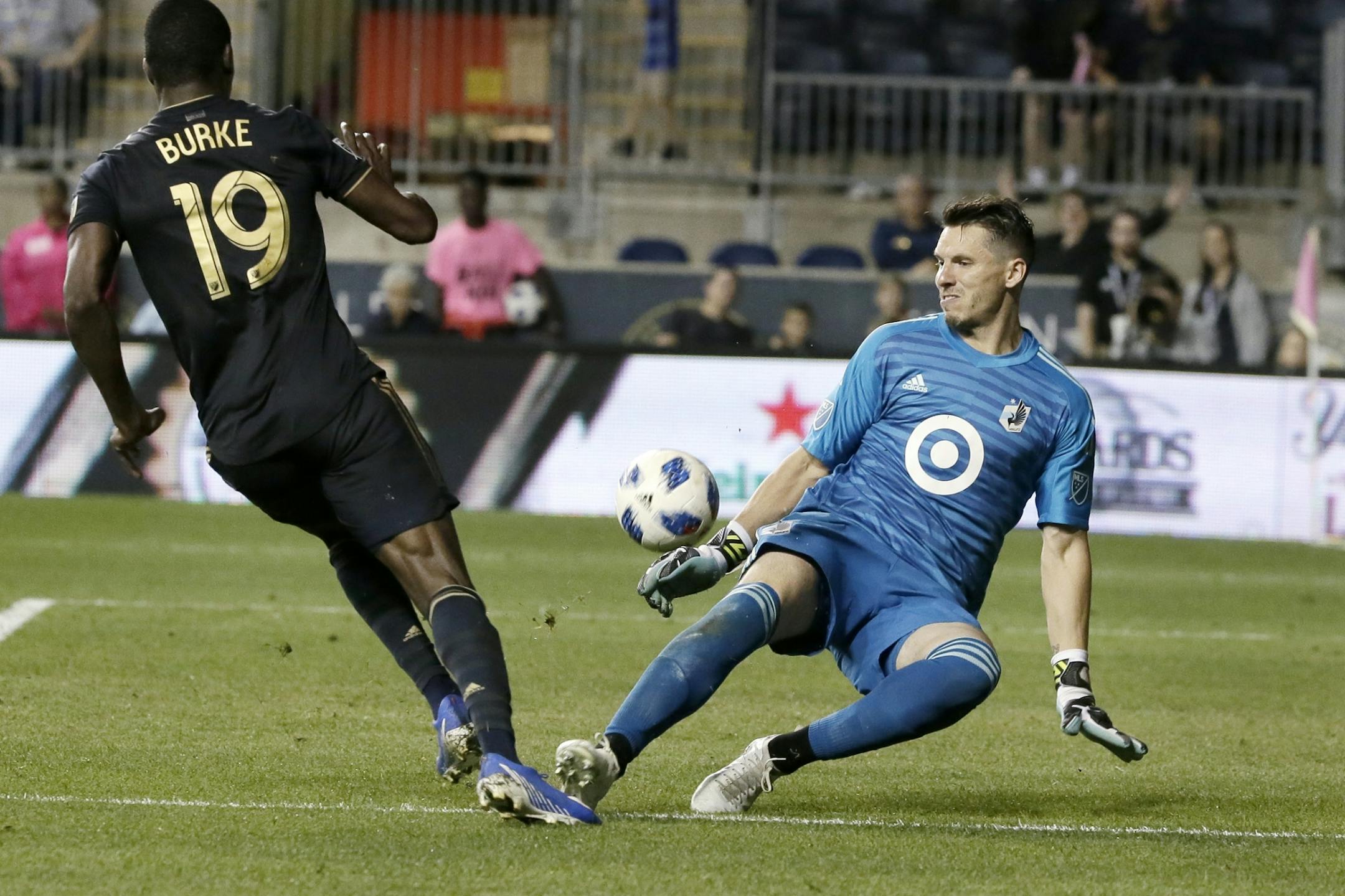 United goalkeeper # 33 Bobby Shuttleworth deflects a shot by Union's # 19 Cory Burke in the 2nd half of the Minnesota United at Philadelphia Union MLS match at Talen Energy Stadium in Chester, Pa. on October 6, 2018. MANDATORY CREDIT: ELIZABETH ROBERTSON / Staff Photographer