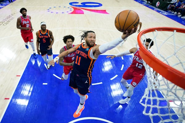 Knicks star Jalen Brunson goes up for a shot during the second half against the 76ers on Sunday in Philadelphia.