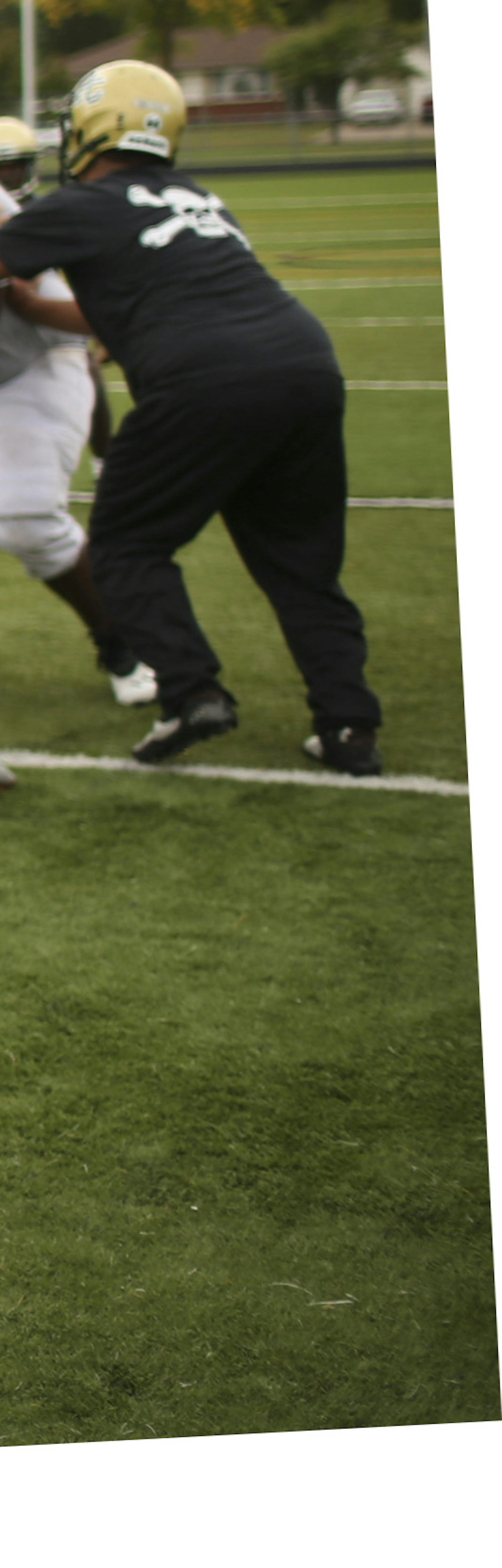 Park Center's Amani Hooker prepared to hand off the football at practice after school Monday. ] JEFF WHEELER ï jeff.wheeler@startribune.com Amani Hooker is a versatile player at quarterback or safety for the Park Center Pirates. He was photographed at practice after school Monday afternoon, September 28, 2015 in Brooklyn Park. ORG XMIT: MIN1509281841440626