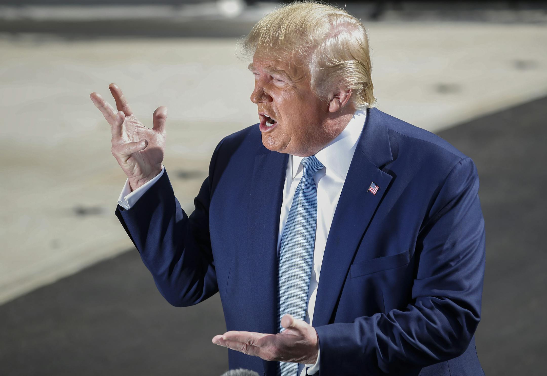 President Donald Trump gestures while speaking to the media on the South Lawn of the White House in Washington, Friday, Oct. 4, 2019, before his departure to nearby Walter Reed National Military Medical Center in Bethesda, Md. (AP Photo/Pablo Martinez Monsivais)
