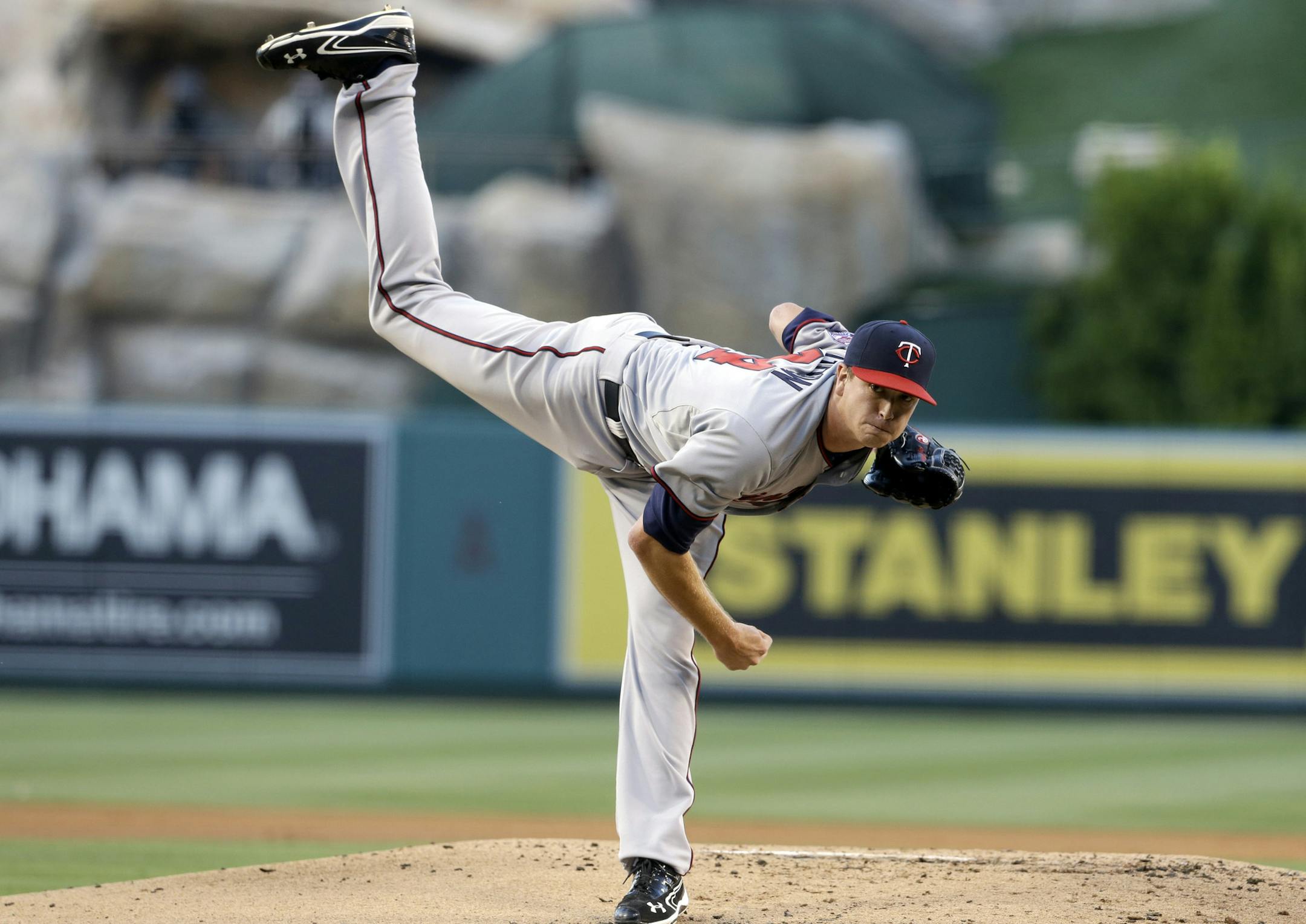 Minnesota Twins starter Kyle Gibson pitches to the Los Angeles Angels in the first inning of a baseball game in Anaheim, Calif., Tuesday, July 23, 2013. (AP Photo/Reed Saxon)
