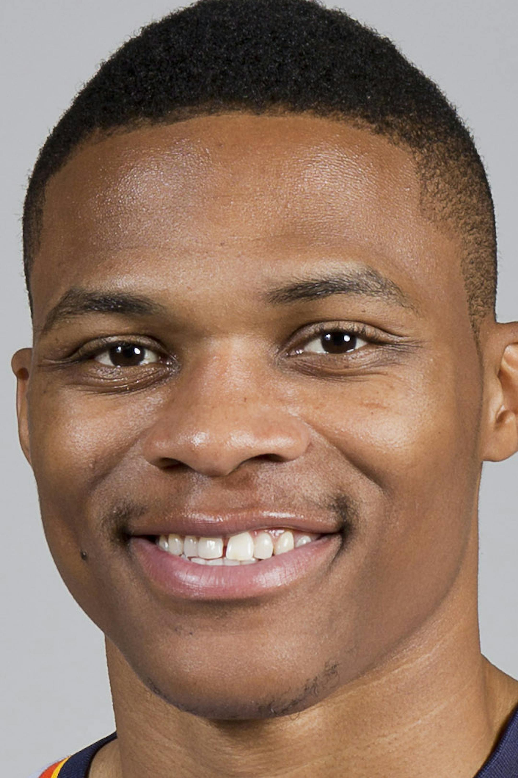 Oklahoma City Thunder's Russell Westbrook poses for a photo during Thunder Media Day in Oklahoma City on Friday, Sept. 27, 2013. (AP Photo/Alonzo Adams) ORG XMIT: NYOTK