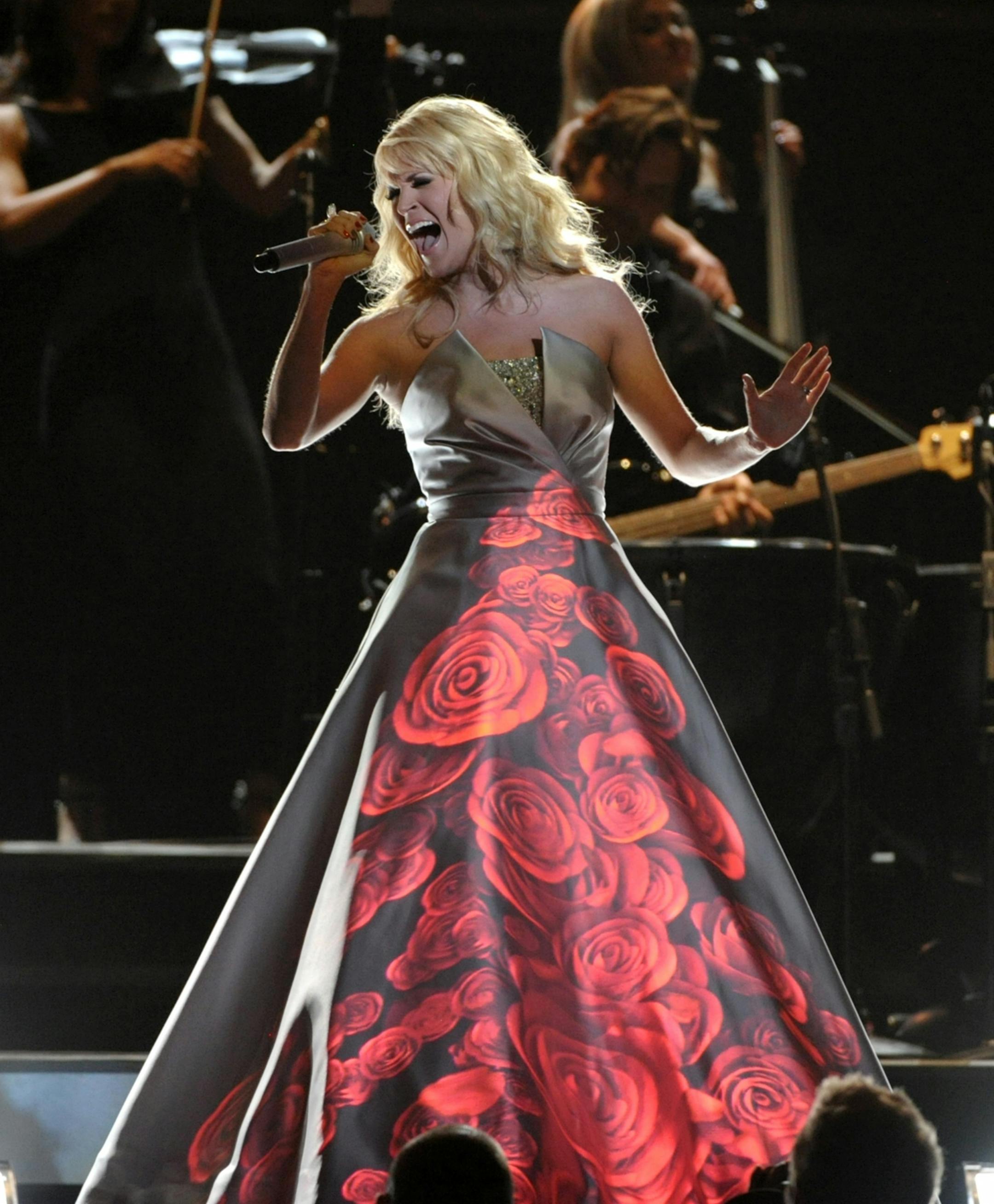 Carrie Underwood performs on stage at the 55th annual Grammy Awards on Sunday, Feb. 10, 2013, in Los Angeles.