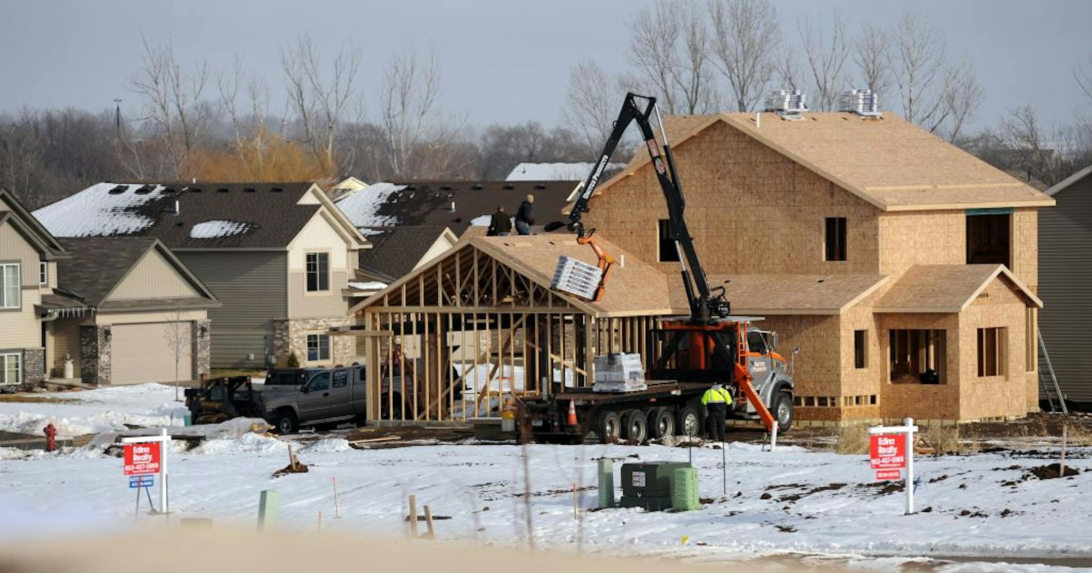 Townhouses, which played a big role in the pre-recession suburban housing boom, have been largely left on the sidelines in the recent recovery. Buyers are gravitating to single-family homes that are now more affordable or opting for apartments. Some cities are replatting undeveloped townhouse sites for single-family houses. The single-family homes in the center of this development, are being built by Keyland Homes on lots where townhouses were planned. The lots were re-platted because there is v