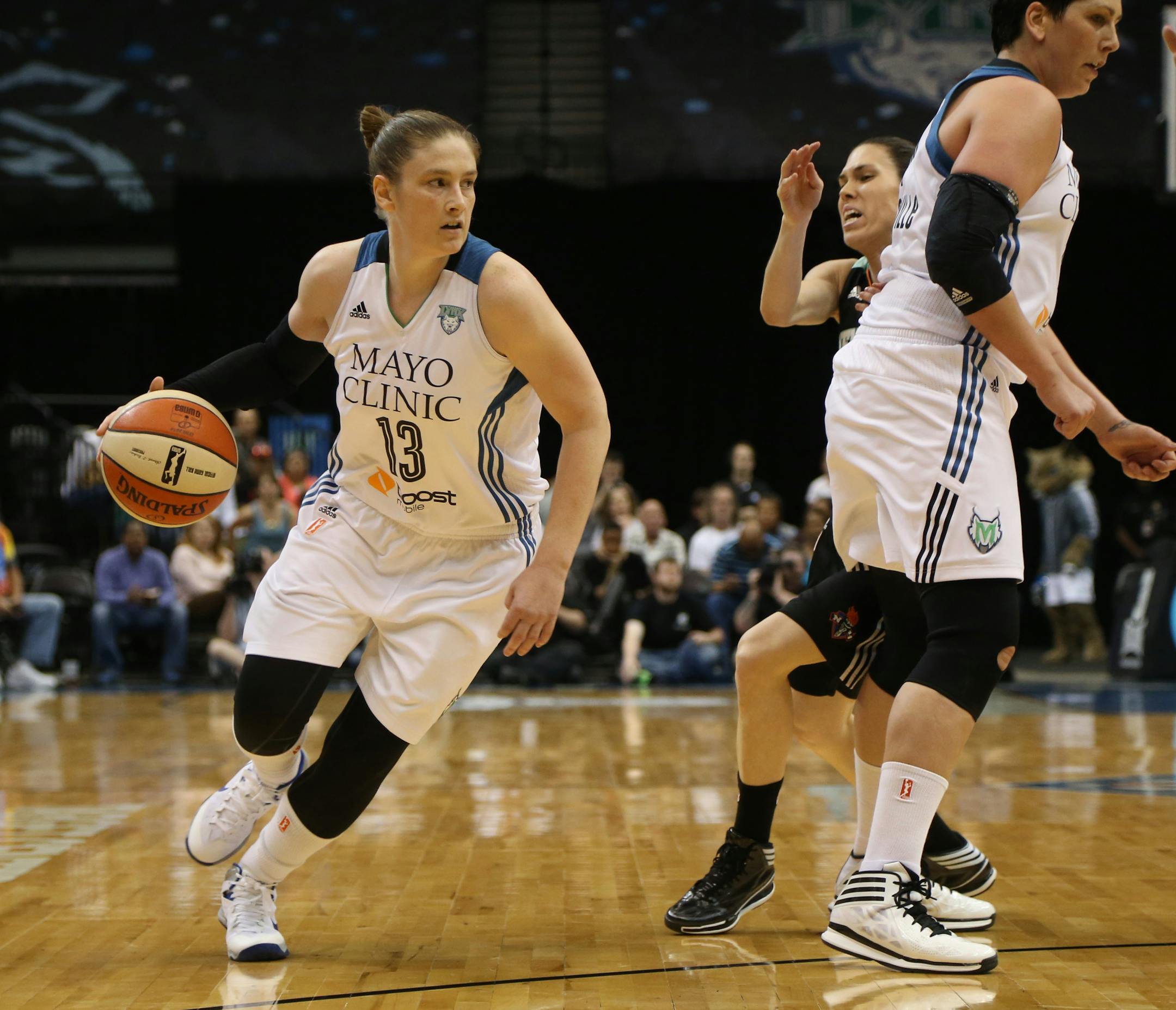 Lynx Janel McCarville set a pick on Liberty's Anna Cruz so that Lindsay Whalen could cut to the basket during the first half. ] (KYNDELL HARKNESS/STAR TRIBUNE) kyndell.harkness@startribune.com Lynx vs New York Liberty at the Target Center in Minneapolis Min. Saturday, May 24, 2014.