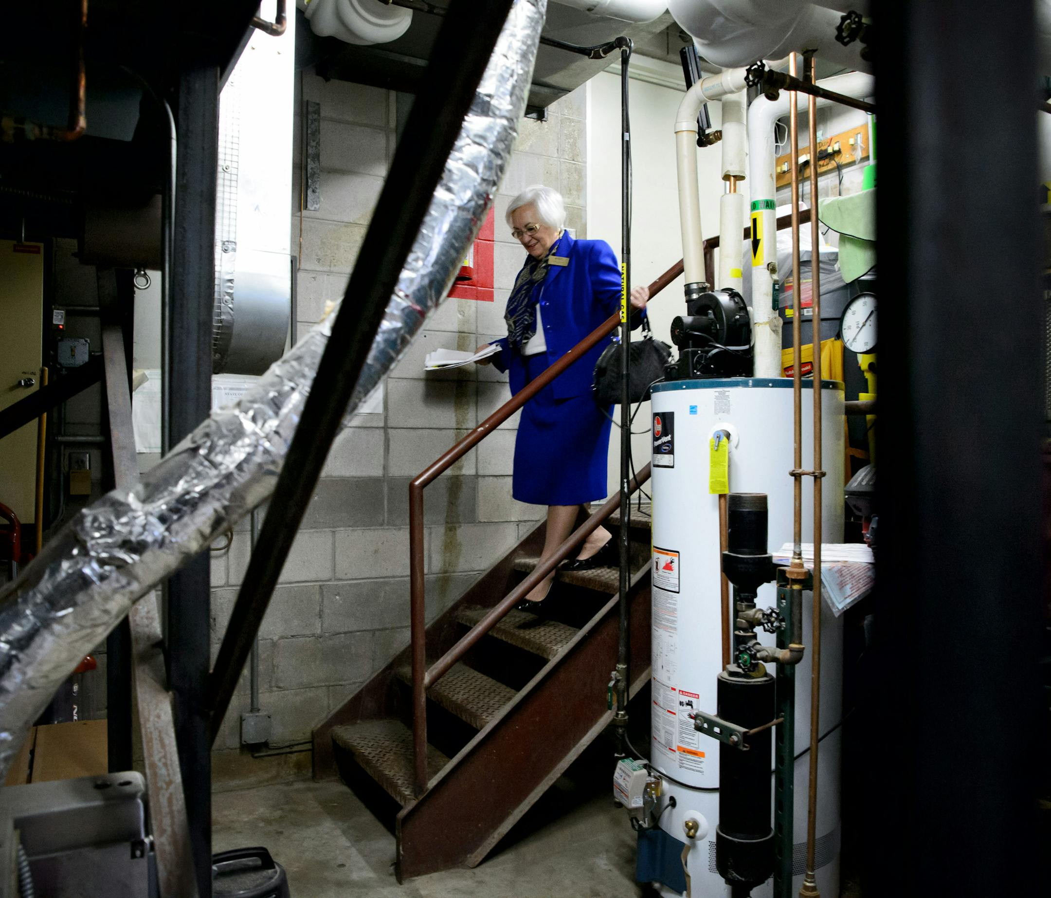 New Hope Mayor Kathi Hemken descended into the boiler room at City Hall, which is small and leaks water, belying the outward appearance of the building.