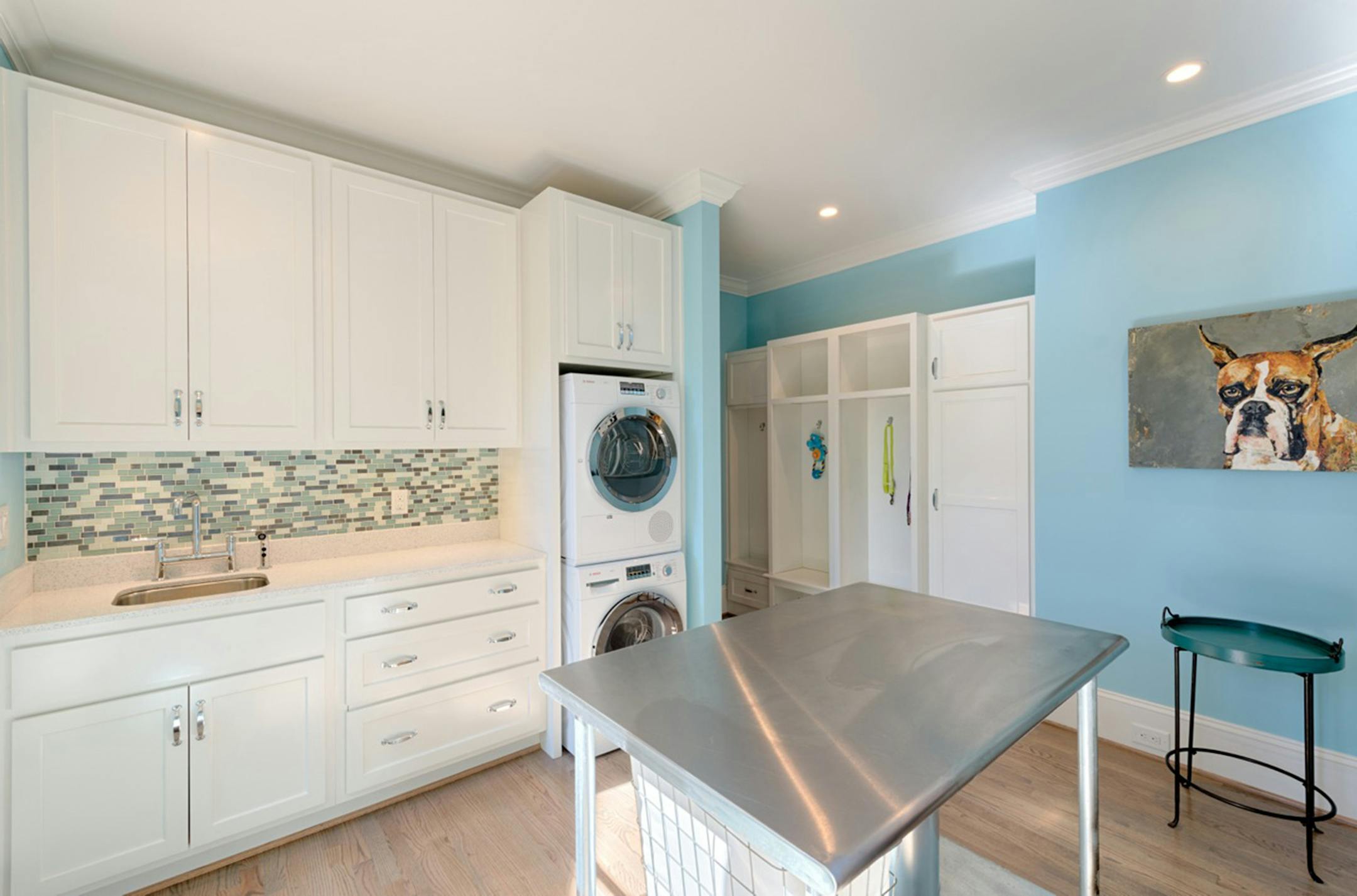 Paint your laundry room a favorite color and add some artwork to the walls. (Charlotte Observer/MCT) ORG XMIT: 1160783
