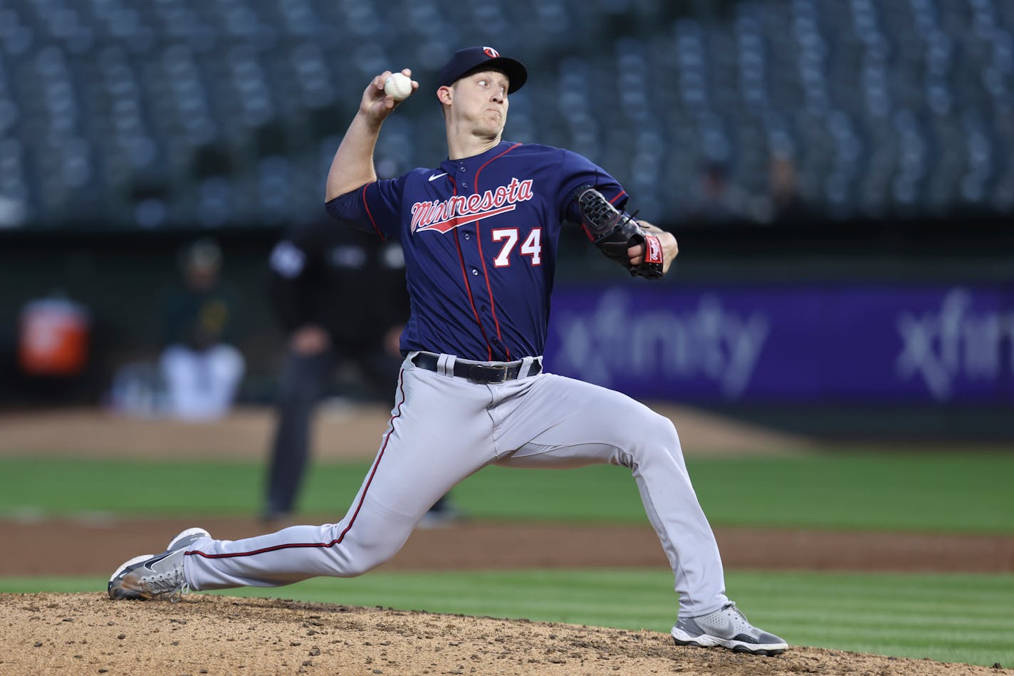 Minnesota Twins' Josh Winder (74) pitches against the Oakland Athletics during the fourth inning of a baseball game in Oakland, Calif., Tuesday, May 17, 2022. (AP Photo/Jed Jacobsohn)