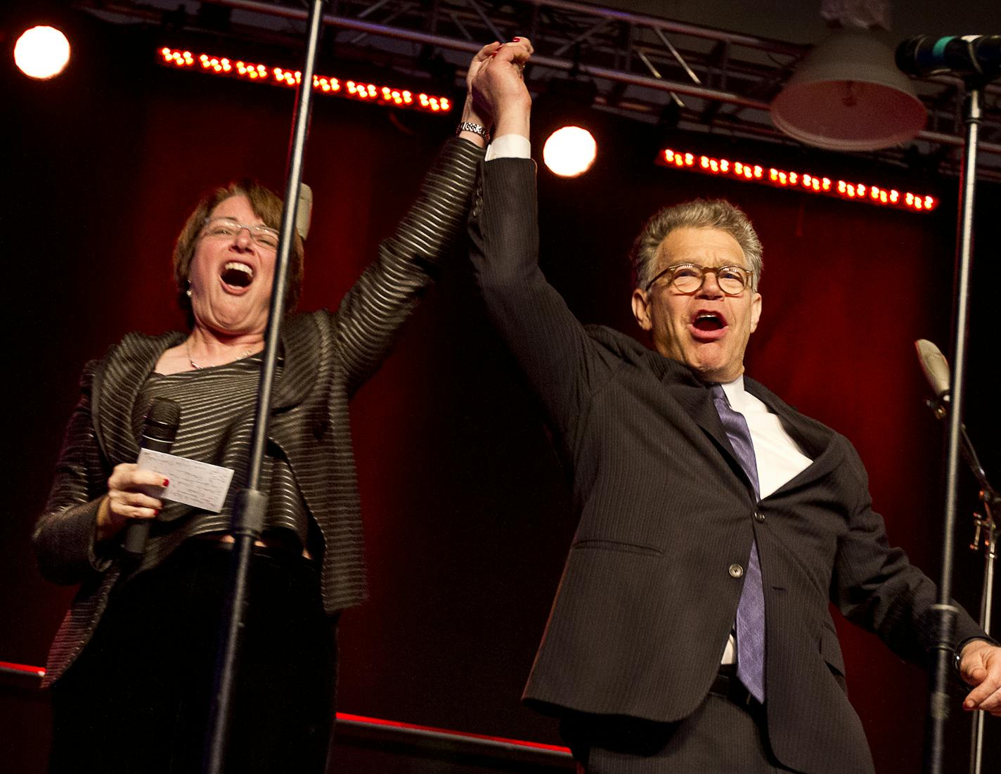 Sen. Amy Klobuchar (D-MN) and Sen. Al Franken (D-MN) celebrate onstage during Minneapolis Mayor Betsy Hodges' inauguration party at the historic Thorp Building in Northeast Minneapolis, Saturday, January 11, 2014. [ BEN BREWER &#x201a;&#xc4;&#xa2; Special to the Star Tribune _ Assignment # 118454 DATE 1/11/14 SLUG: FACE011414 EXTRA INFORMATION: Conclusion of "One Minneapolis" promotion over the past ten days with a focus on the arts and entertainment scene in the city.