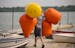 Darin Newman carried buoys he would use to set up the course on Lake Harriet. Sailors from Twin Cities Sailing Club and Lake Harriet Yacht Club took p