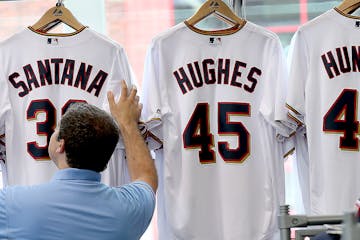 John Cwodzinski, who works at the Twins&#x2019; Target Field store, checked through the stock of jerseys in preparation for Friday&#x2019;s game again