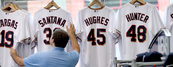 John Cwodzinski, who works at the Twins&#x2019; Target Field store, checked through the stock of jerseys in preparation for Friday&#x2019;s game again