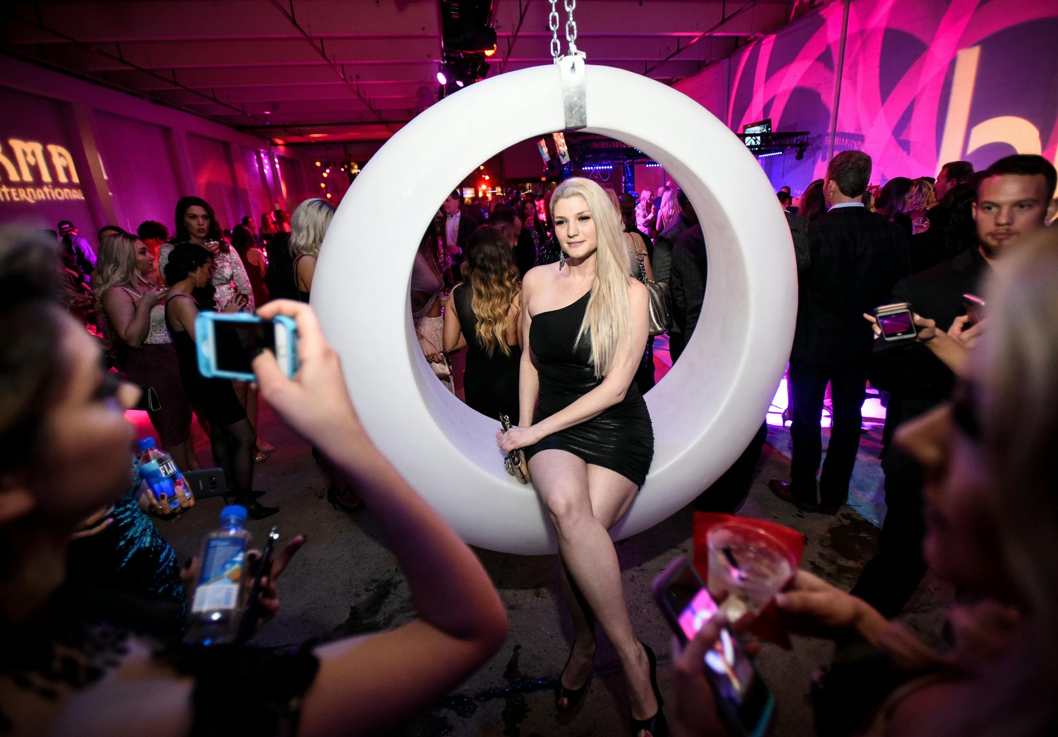 Natalie L¸ders, of Calgary, posed for a photo on a swing at Maxim Magazine's VIP party Saturday night. ] AARON LAVINSKY ï aaron.lavinsky@startribune.com What was it like to party for the Super Bowl? We photograph Maxim Magazine's VIP Super Bowl party in a giant temporary dome with DJ Marshmello on Saturday, Feb. 3, 2018 in Minneapolis, Minn.