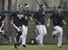 New York Yankees' Alex Rodriguez, left, runs with his teammates during a spring training baseball workout at the Yankees minor league facility, Tuesda