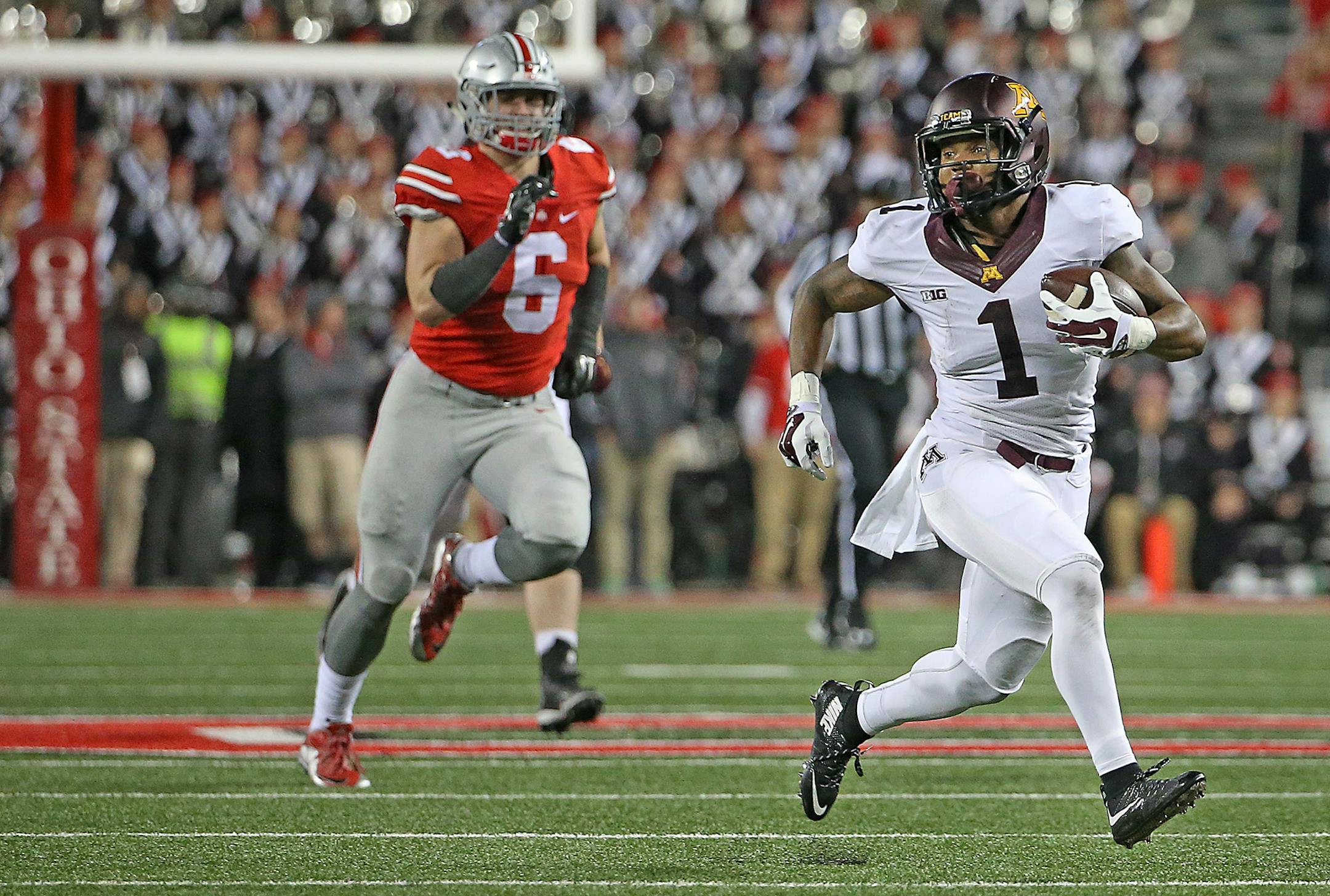 Minnesota's wide receiver KJ Maye carried the ball in the fourth quarter