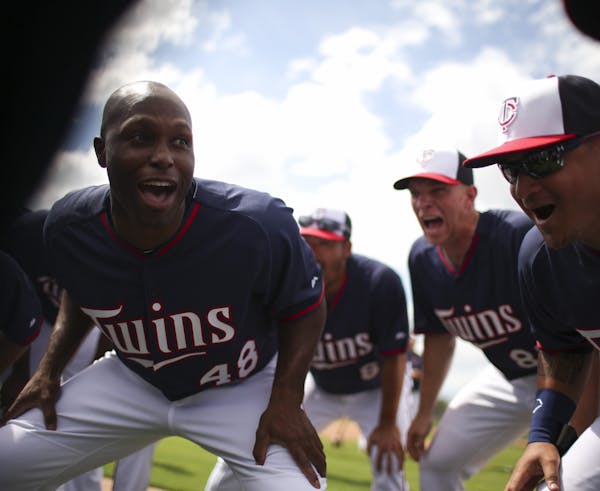 Twins outfielder Torii Hunter (48) led what's become a regular cheer at the conclusion of the workout Tuesday afternoon at Hammond Stadium.