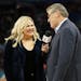 ESPN's Holly Rowe interviews UConn coach Geno Auriemma Friday at Target Center.