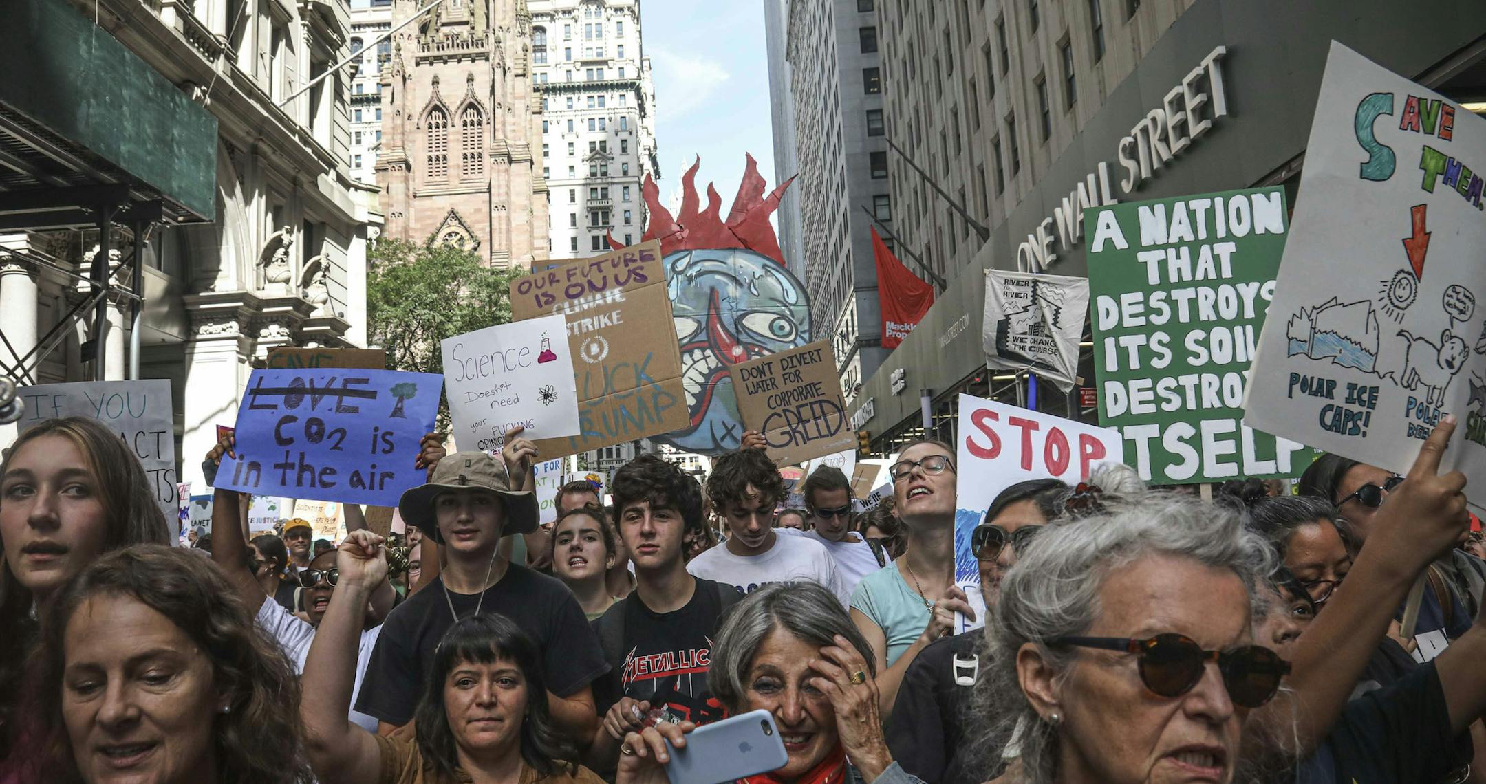 Climate change activists participate in an environmental demonstration as part of a global youth-led day of action, Friday Sept. 20, 2019, in New York. A wave of climate change protests swept across the globe Friday, with hundreds of thousands of young people sending a message to leaders headed for a U.N. summit: The warming world can't wait for action. (AP Photo/Bebeto Matthews)