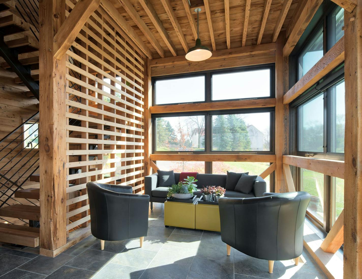 Home of the Month - Two farm granaries from different eras were turned into a modern multi-functional home on an old farmstead, designed by Rehkamp Larson Architects.