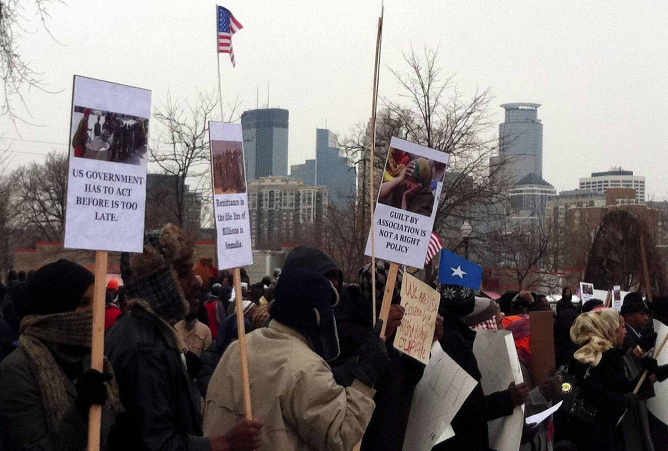 Twin Cities Somalis demonstrated Friday, Dec. 30, 2011, in Minneapolis over a bank's plan to stop allowing money transfers from Minnesota's Somali community to relatives in Somalia.