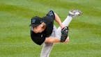 Marlins pitcher Max Meyer delivers during the first inning of a game against the Pirates on July 23, 2022, in Pittsburgh. The former Gophers standout 