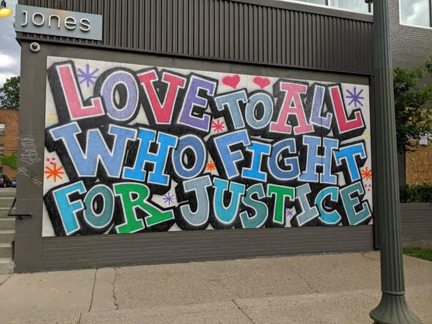 On Floyd Zeus Jones, 2429 Nicollet Ave, artists express hope for the future following the death of George Floyd by Minneapolis police.