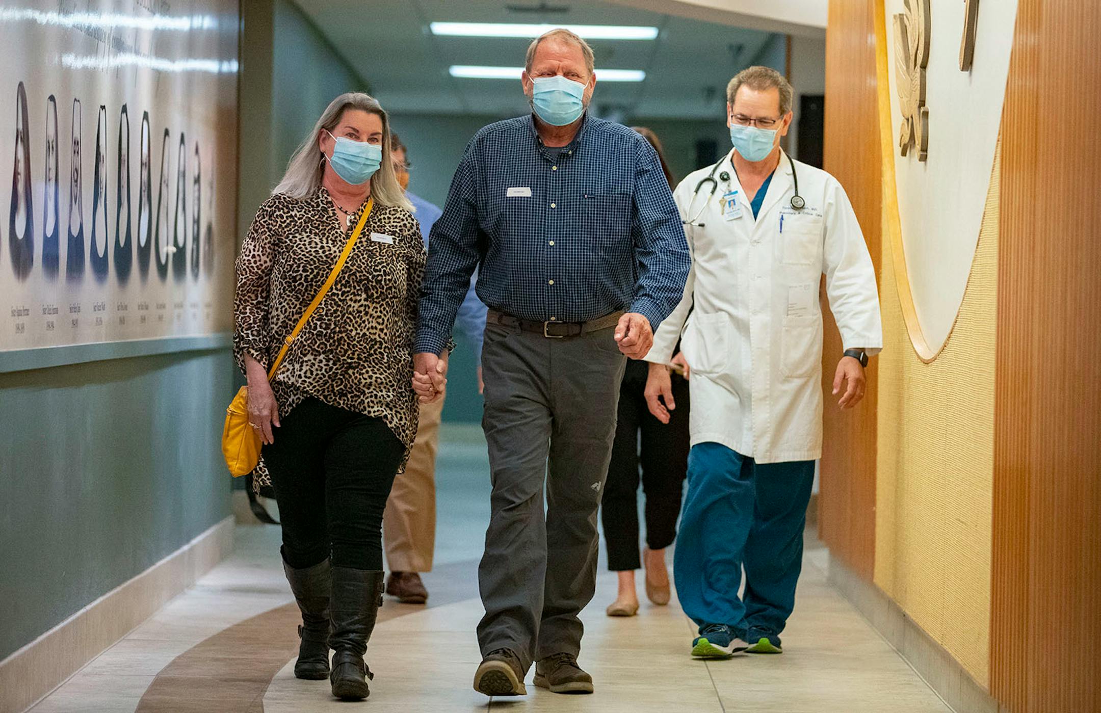 Bob Schlicht, his wife Kristine Smoley, and Dr. Tim Rich, M.D. walked down the hall to meet the only other person in the world to receive the same experimental ARDS treatment as him. The meeting took place at Essentia Health-St. Mary's Medical Center in Duluth on Friday October 16, 2020.