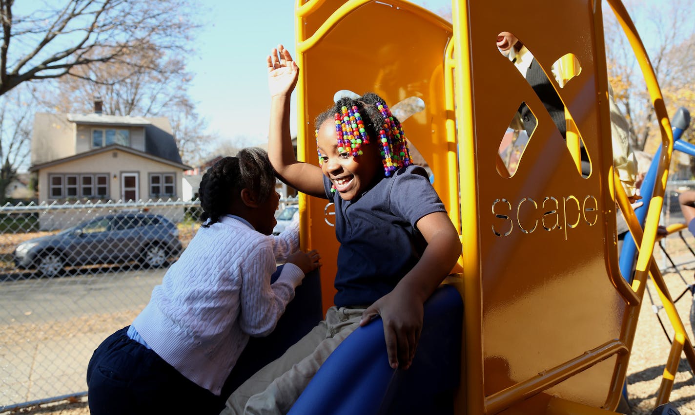 Second-grader Anaya Granderson, 7, played during recess on a new playground at Friendship Academy of the Arts in Minneapolis.