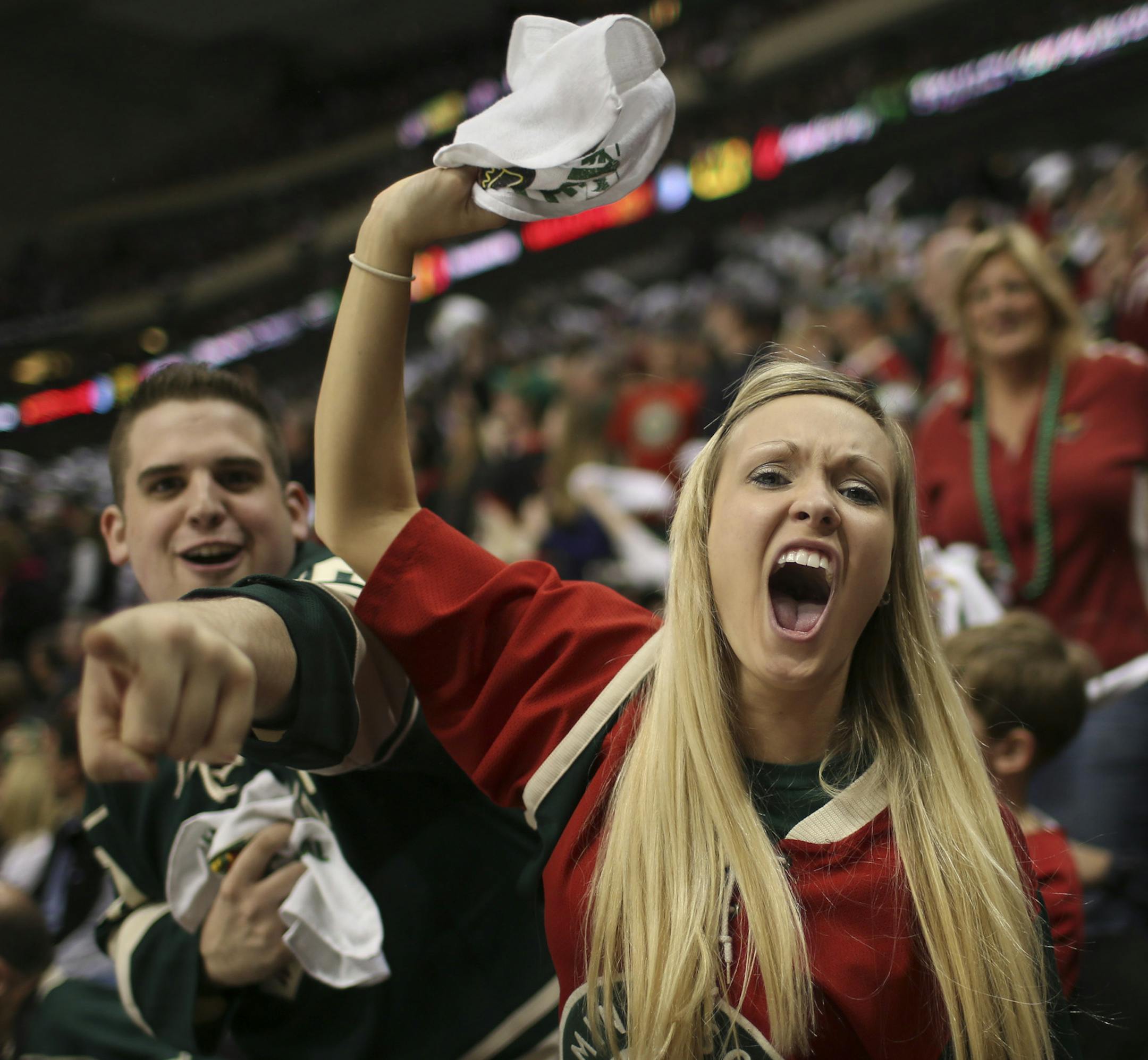 The Minnesota Wild beat the Chicago Black Hawks 3-2 in overtime in game three of their first round playoff series Sunday afternoon, May 25, 2013 at Xcel Energy Center in St. Paul. Happy Wild fans got wild in the third period, shortly before Chicago tied the game to force overtime. ] JEFF WHEELER ‚Ä¢ jeff.wheeler@startribune.com