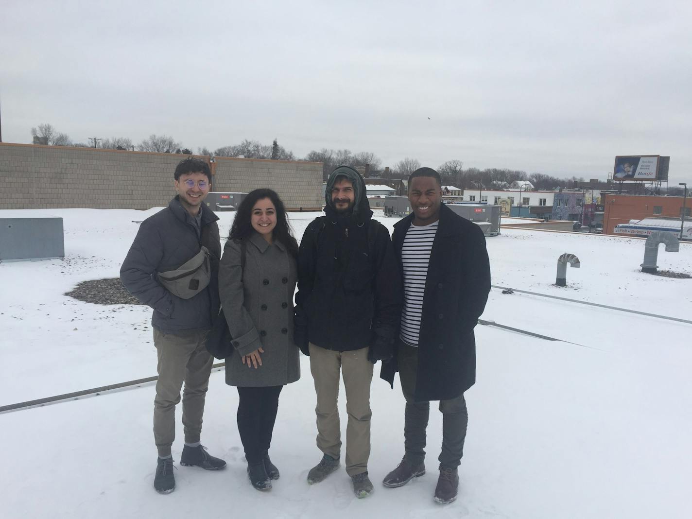 The first community garden in North Minneapolis will be built this spring atop Shiloh Temple at 1201 W. Broadway and provide enough electricity to power the church, neighboring Masjid an Nur Mosque and 26 neighborhood households. Pictured are Nicky Leingang and Sorour Mahyar, who work for U.S. Rep. Keith Ellison; General Manager Timothy DenHerder-Thomas of Cooperative Energy Futures and Joshua Stewart of Ellison's office. Photo: Minnesota Interfaith Power & Light