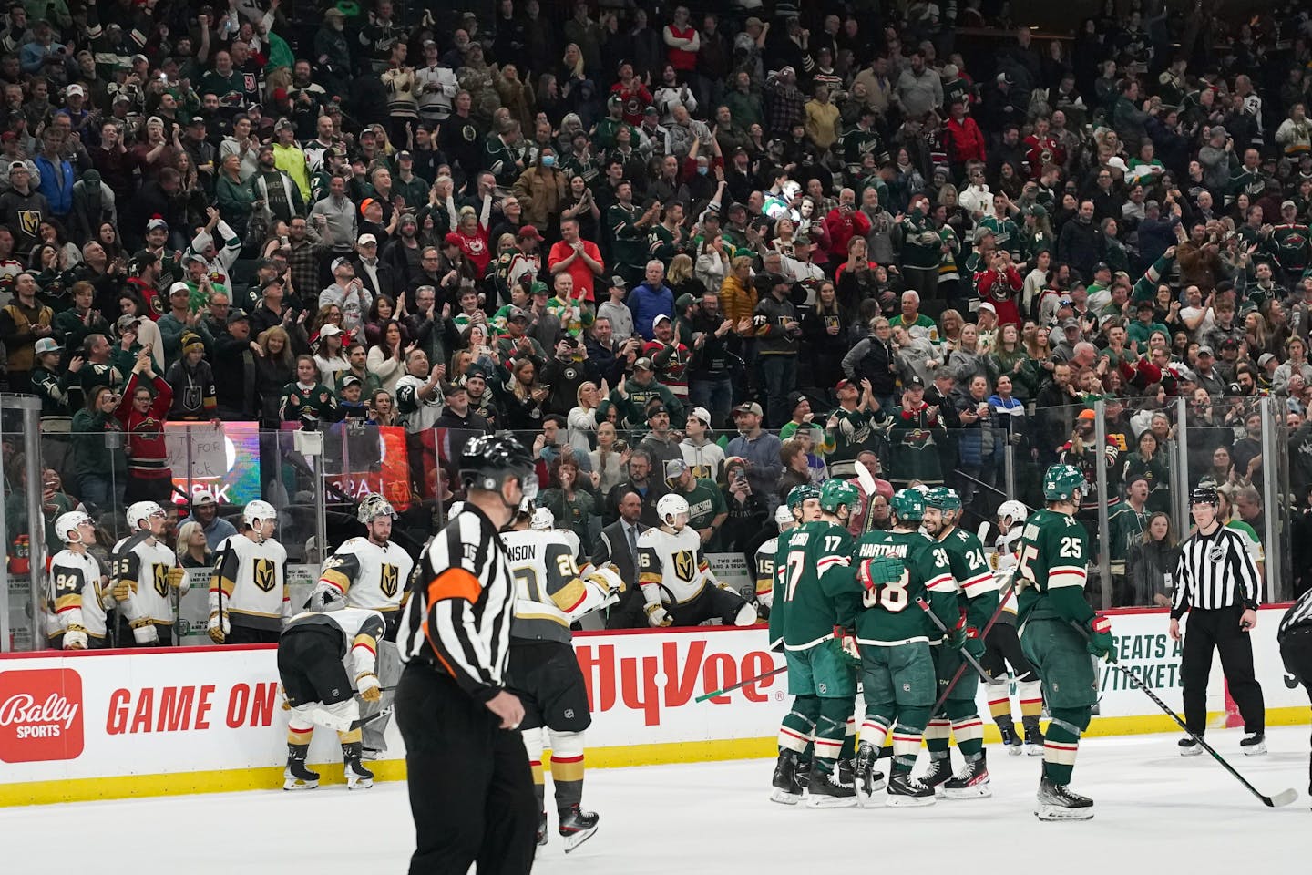 Teammates congratulate Minnesota Wild right wing Ryan Hartman (38) after he scored the third goal of the game against Vegas after Vegas pulled their goalie. The Minnesota Wild hosted the Vegas Golden Knights at the Xcel Energy Center, Monday, March 21, 2022, St. Paul, Minn. ] GLEN STUBBE • glen.stubbe@startribune.com