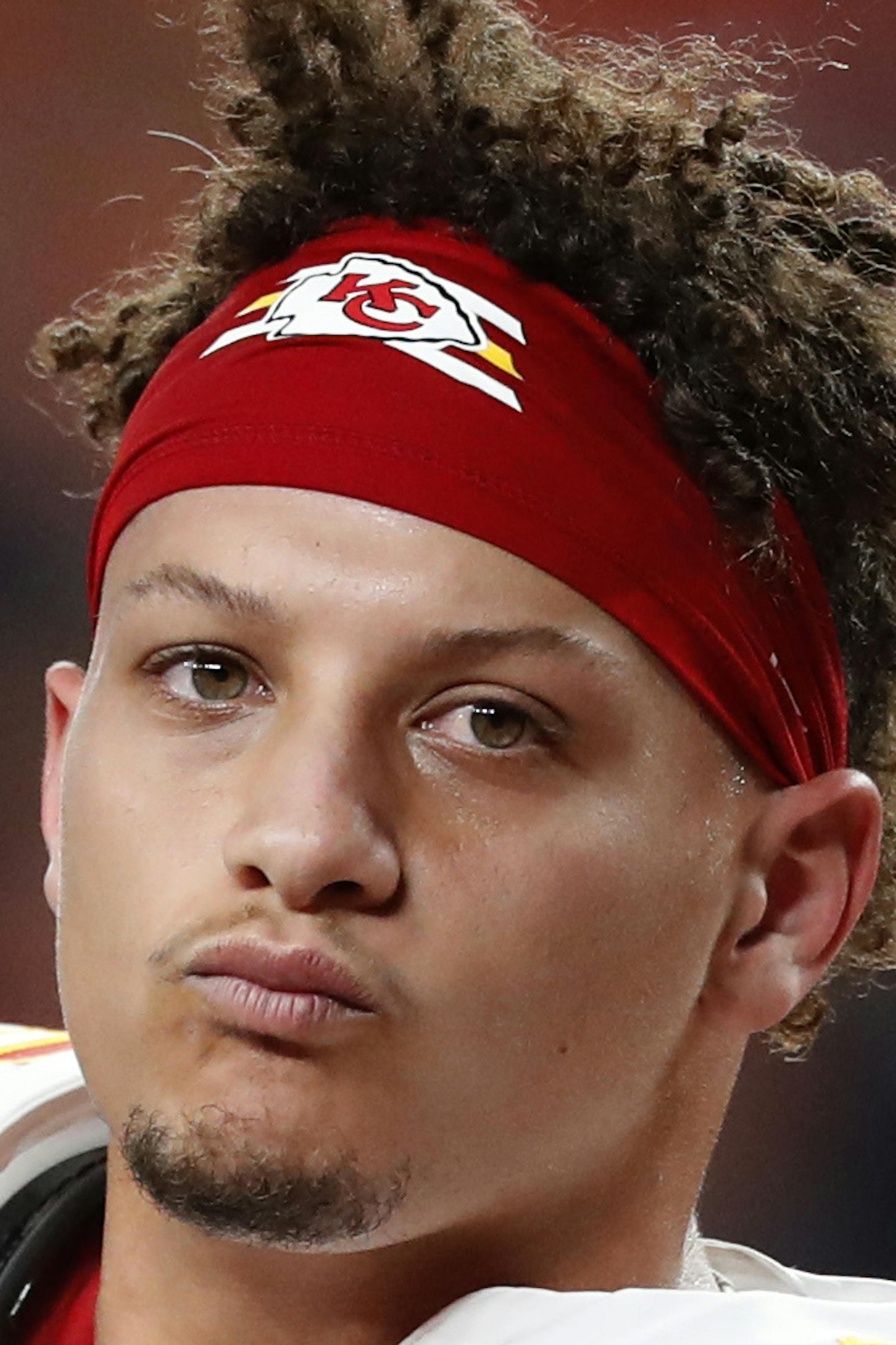 Kansas City Chiefs quarterback Patrick Mahomes (15) is helped off the field after being injured against the Denver Broncos during the first half of an NFL football game, Thursday, Oct. 17, 2019, in Denver. (AP Photo/David Zalubowski)